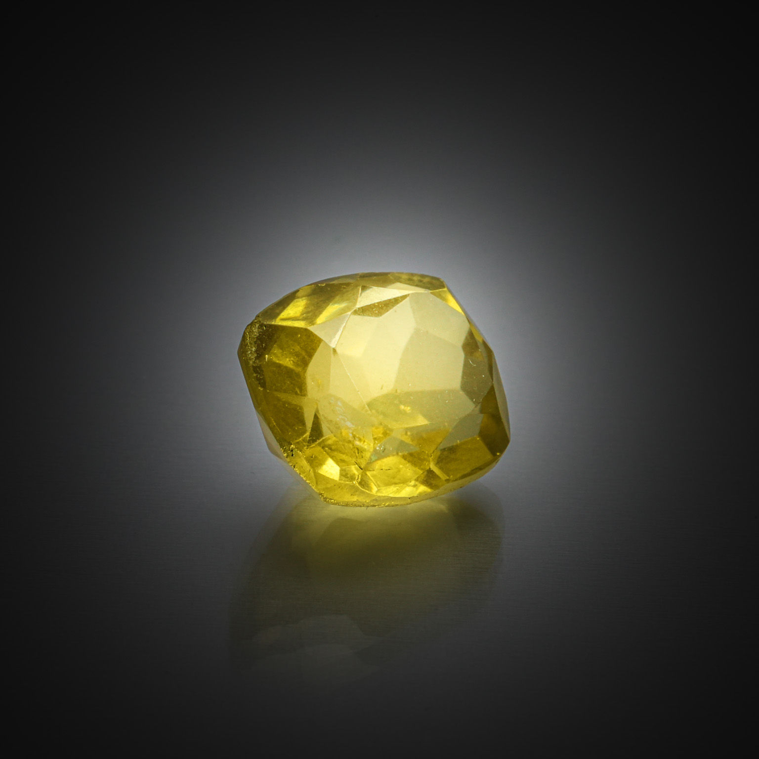 Lot de dix grenats grossulaire bruts sur papier. - Lazuli