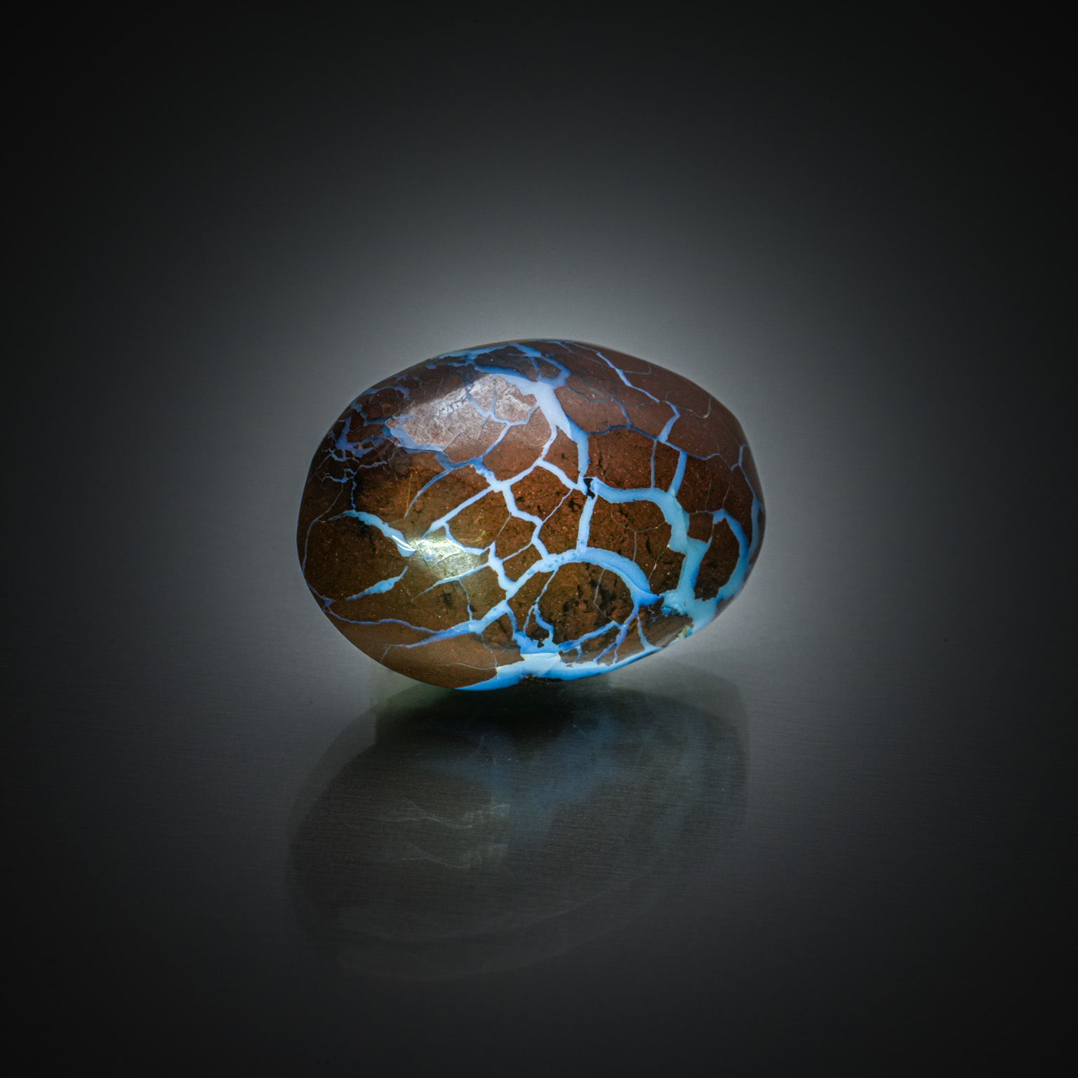 Opale matrix boulder ovale cabochon sur papier. - Lazuli