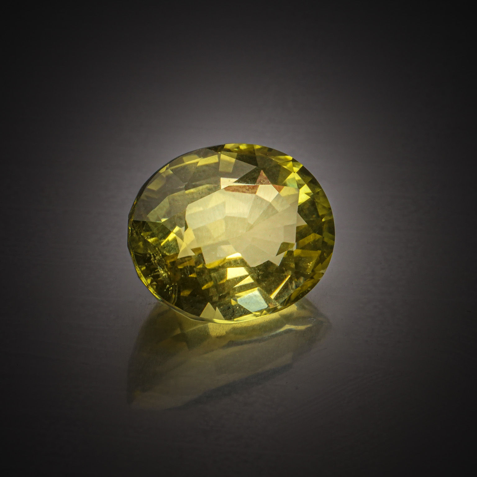 Lot de cinq grenats spessartites ovales et poire sur papier. - Lazuli