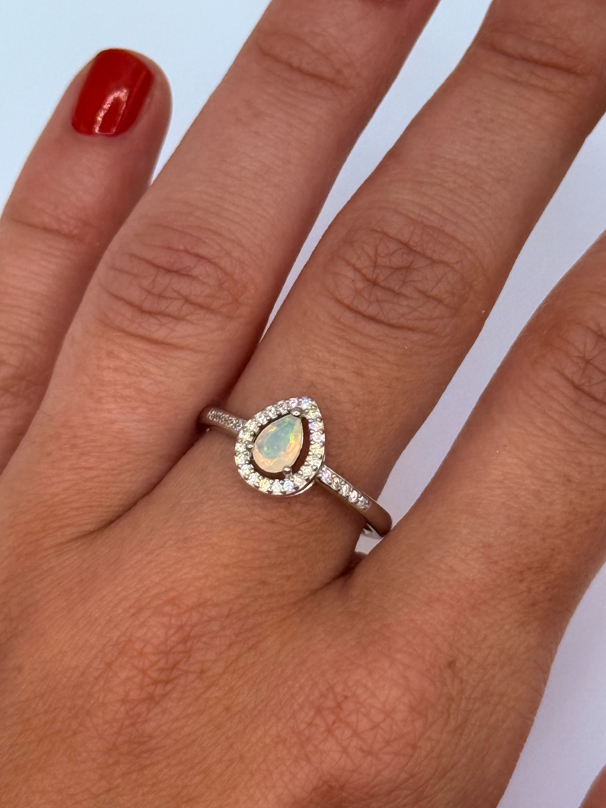 Bague en argent (925 millième) ornée de péridots ronds et saphirs oranges. - Lazuli