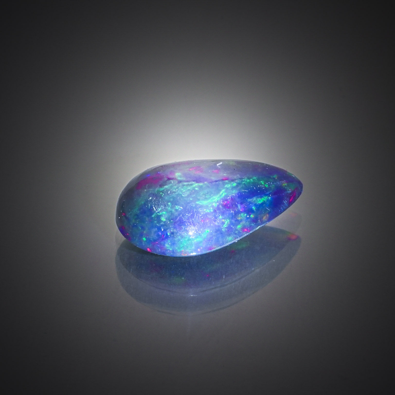 Amétrine ovale cabochon sur papier. - Lazuli