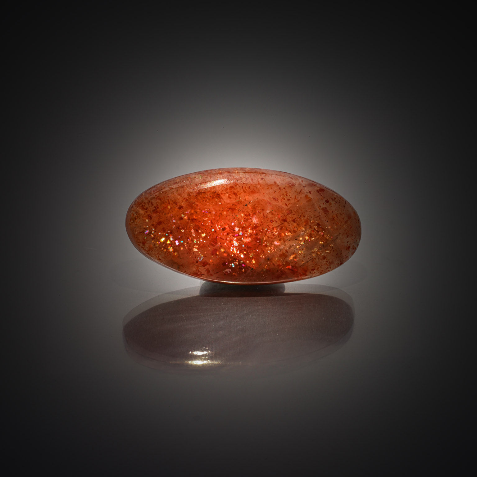 Héliolite ovale cabochon sur papier. - Lazuli