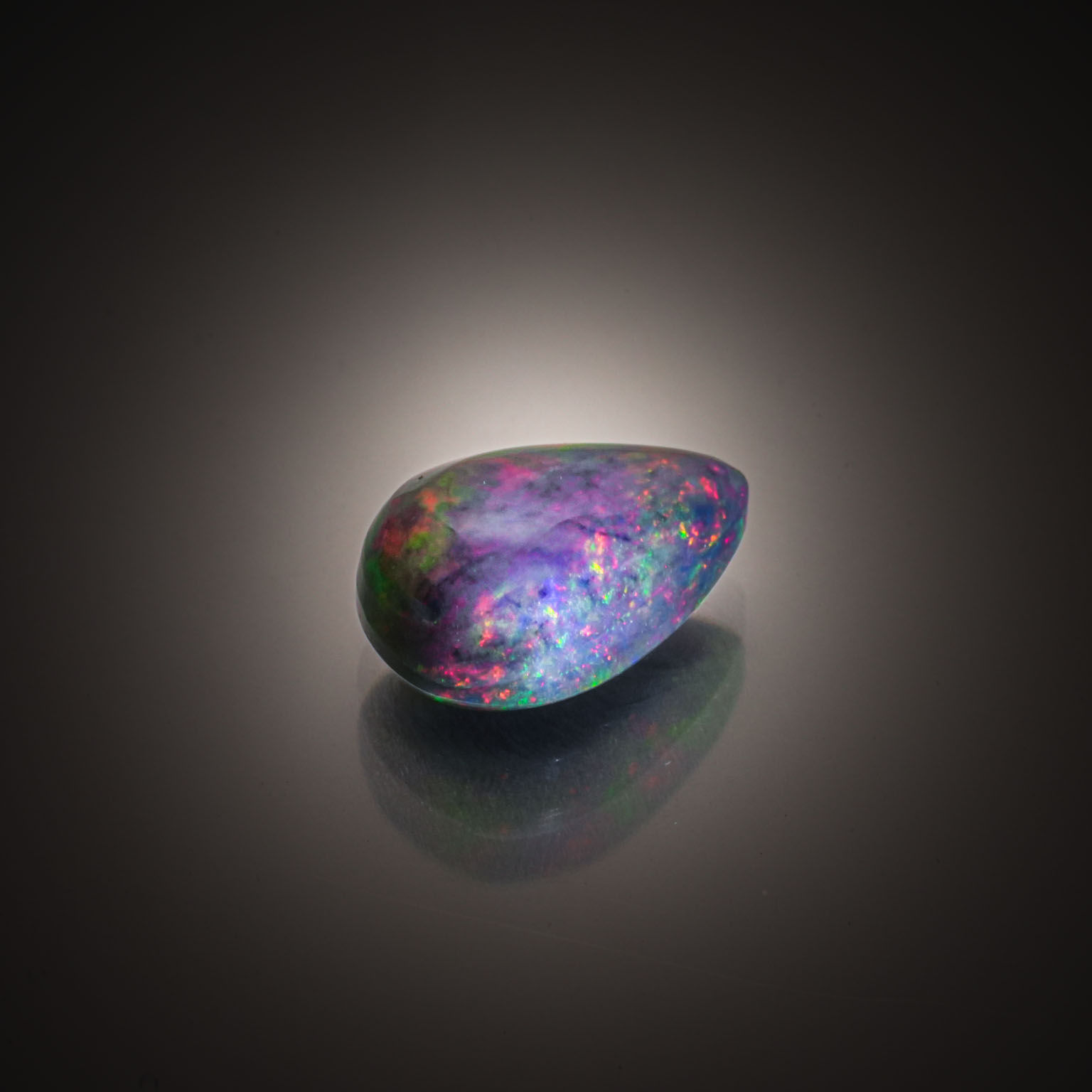 Lot de quatre saphirs carrés sur papier. - Lazuli