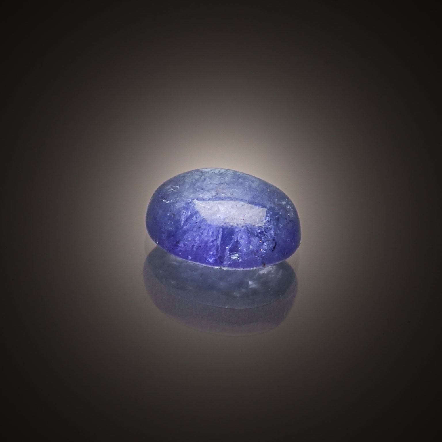 Topaze bleue cœur sur papier. - Lazuli