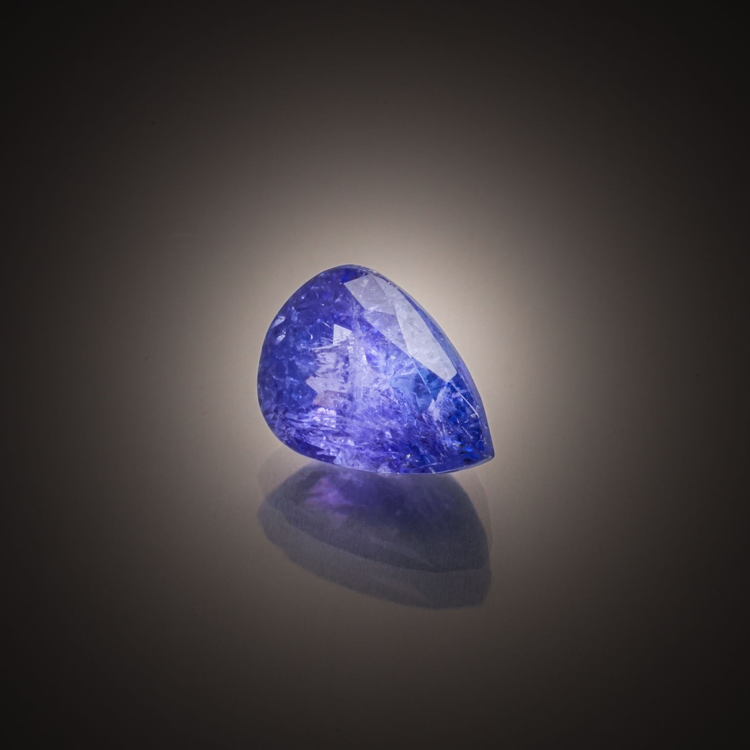Lot de tanzanites ovales sur papier. - Lazuli
