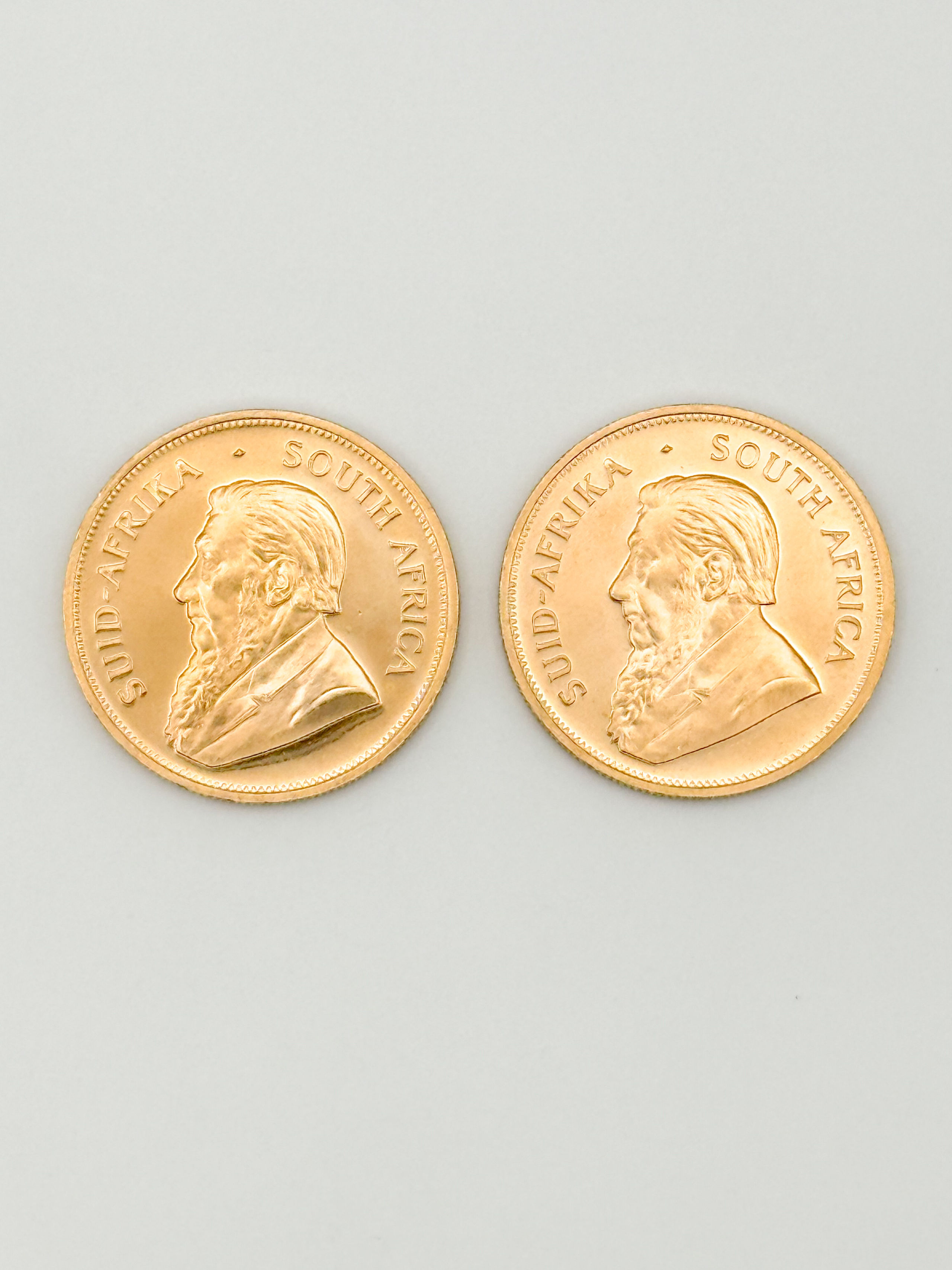 Lot de deux pièces en or de 1 oz kruggerand (1979 x 2). - Lazuli