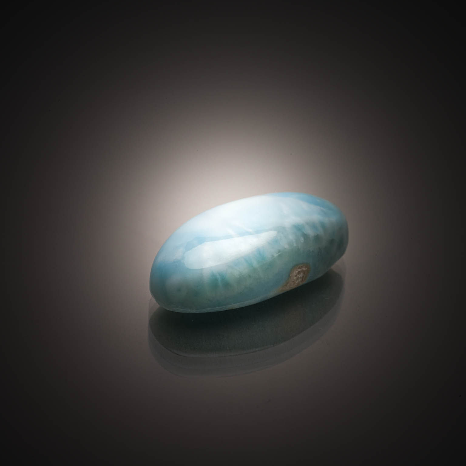 Pierre de lune poire cabochon sur papier. - Lazuli