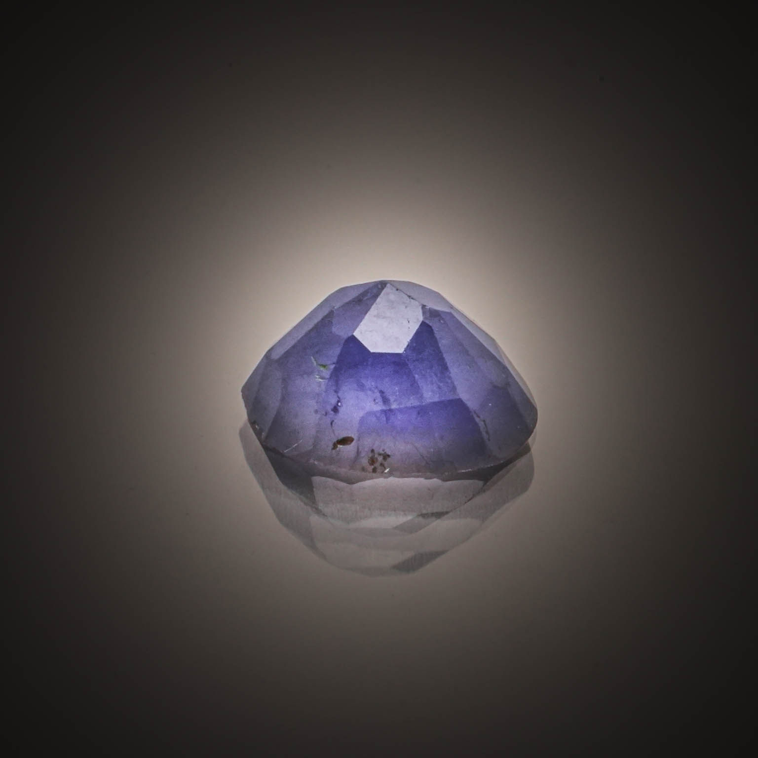 Grandidierite ovale sur papier. - Lazuli