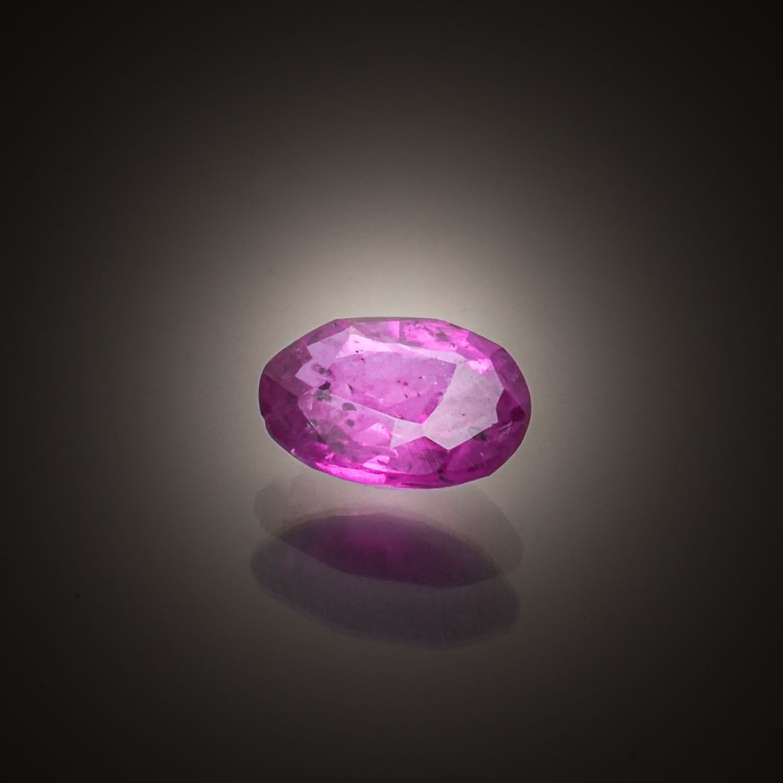 Lot de tanzanites rondes sur papier. - Lazuli