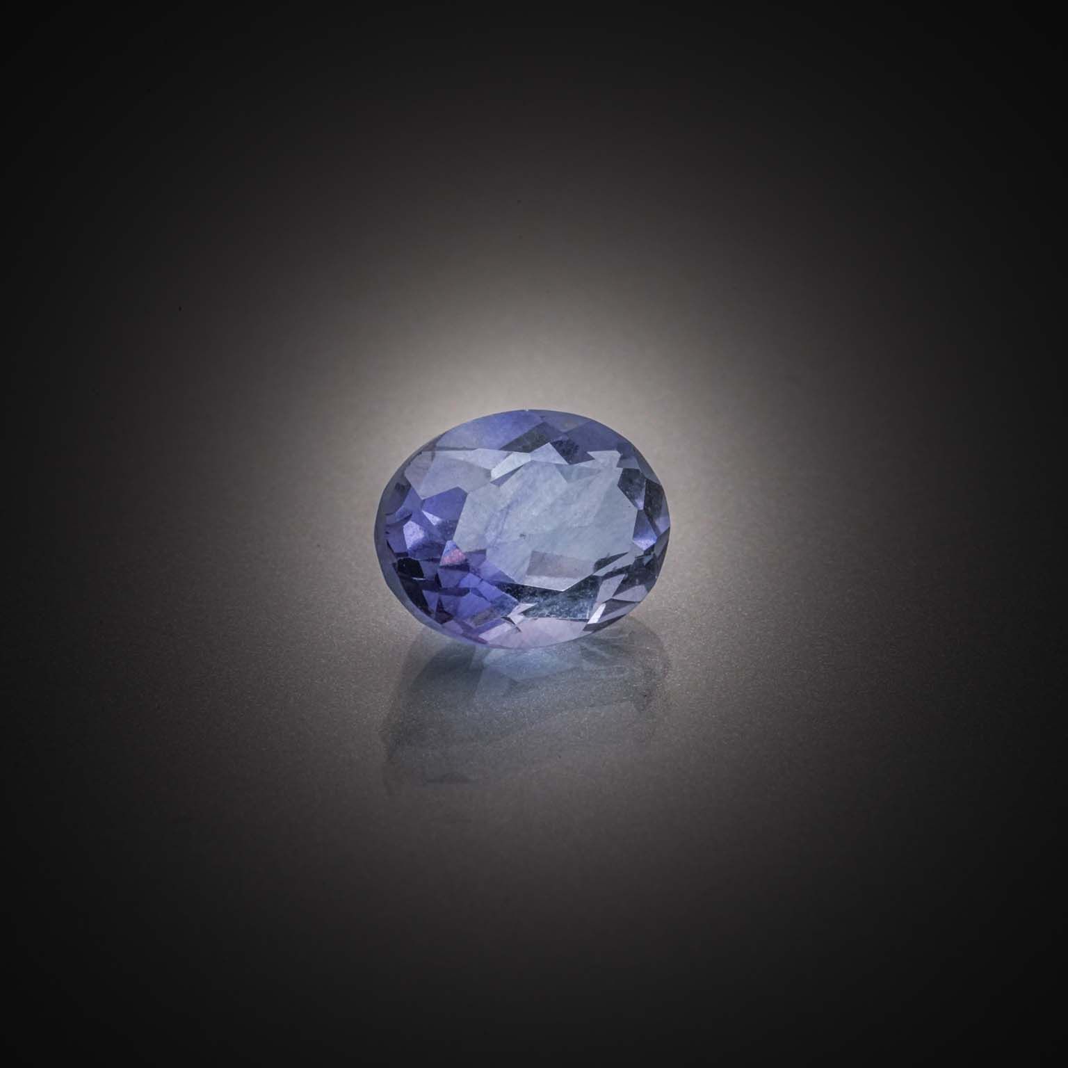 Opale cabochon sur papier. - Lazuli