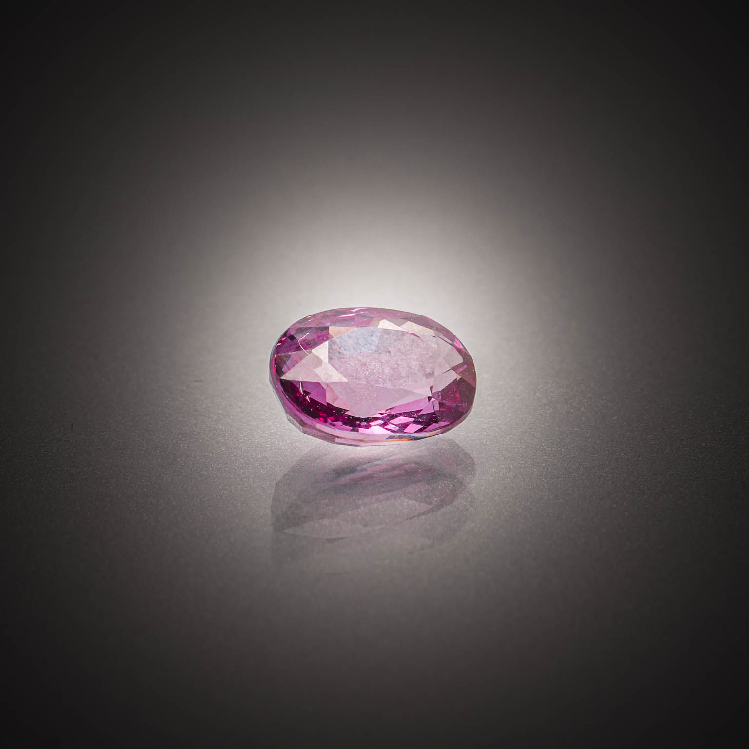 Lot de grenats rhodolites roses ronds sur papier. - Lazuli