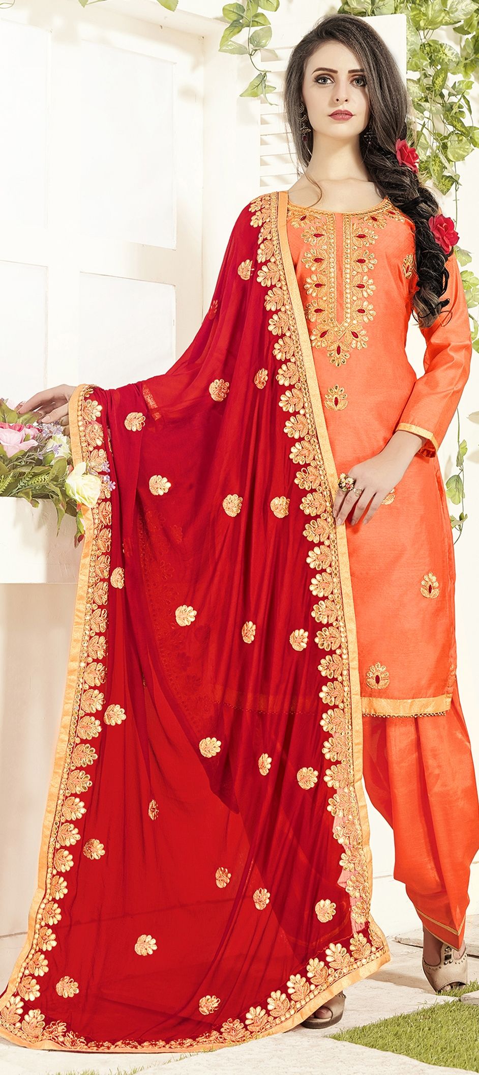 1502138 Orange color Salwar Kameez