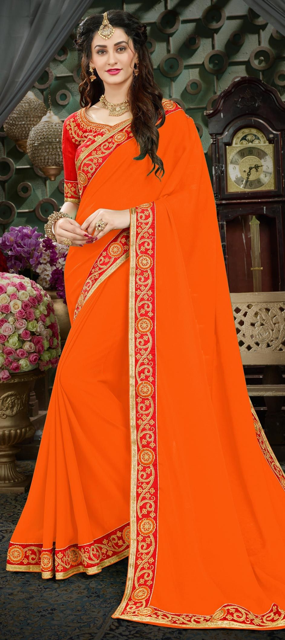 1504065 Orange color Sarees