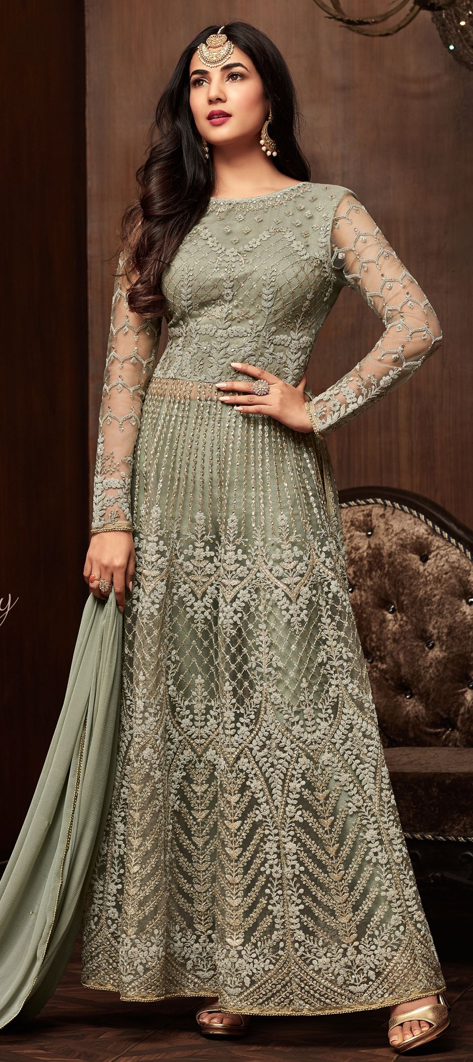 1518329: Bollywood Green color Net fabric Salwar Kameez