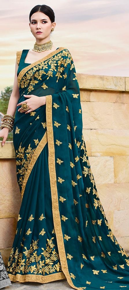 Peacock green plain body georgette designer saree features contrast dark  blue sequin work & embroidered border & blouse