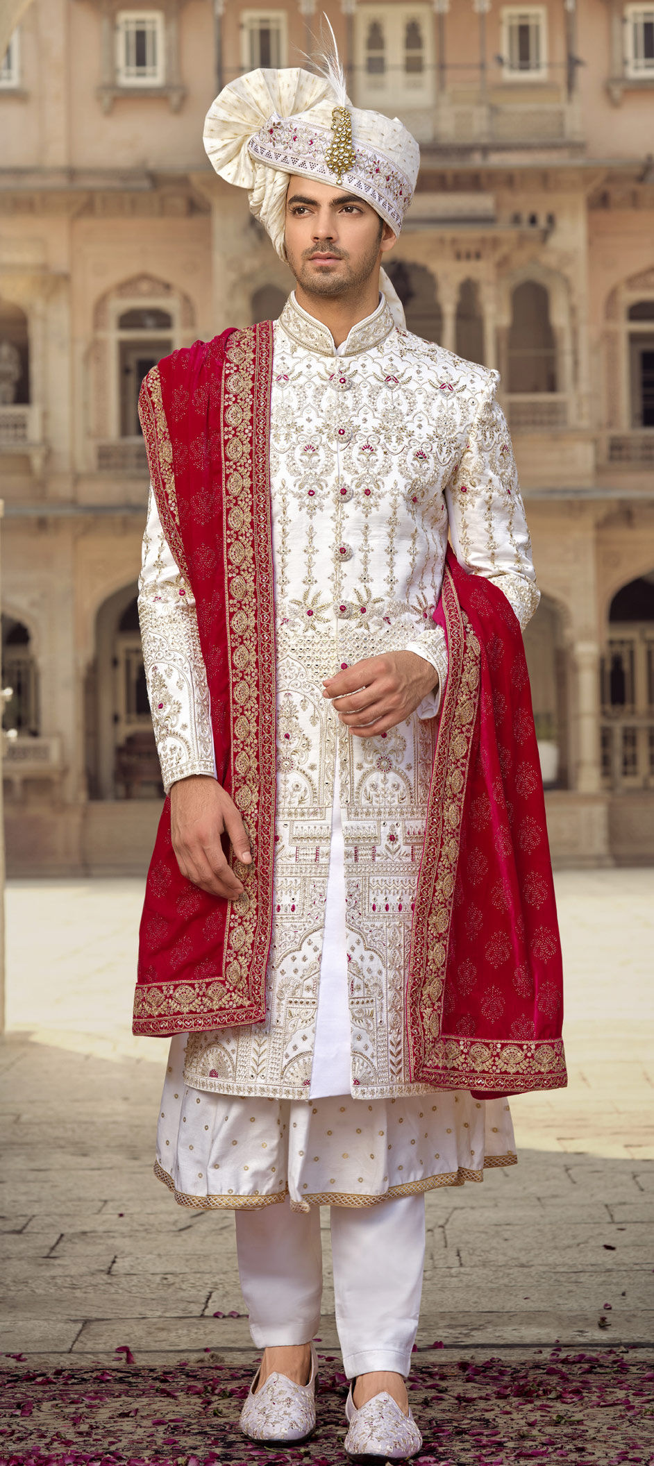 white sherwani with red shawl