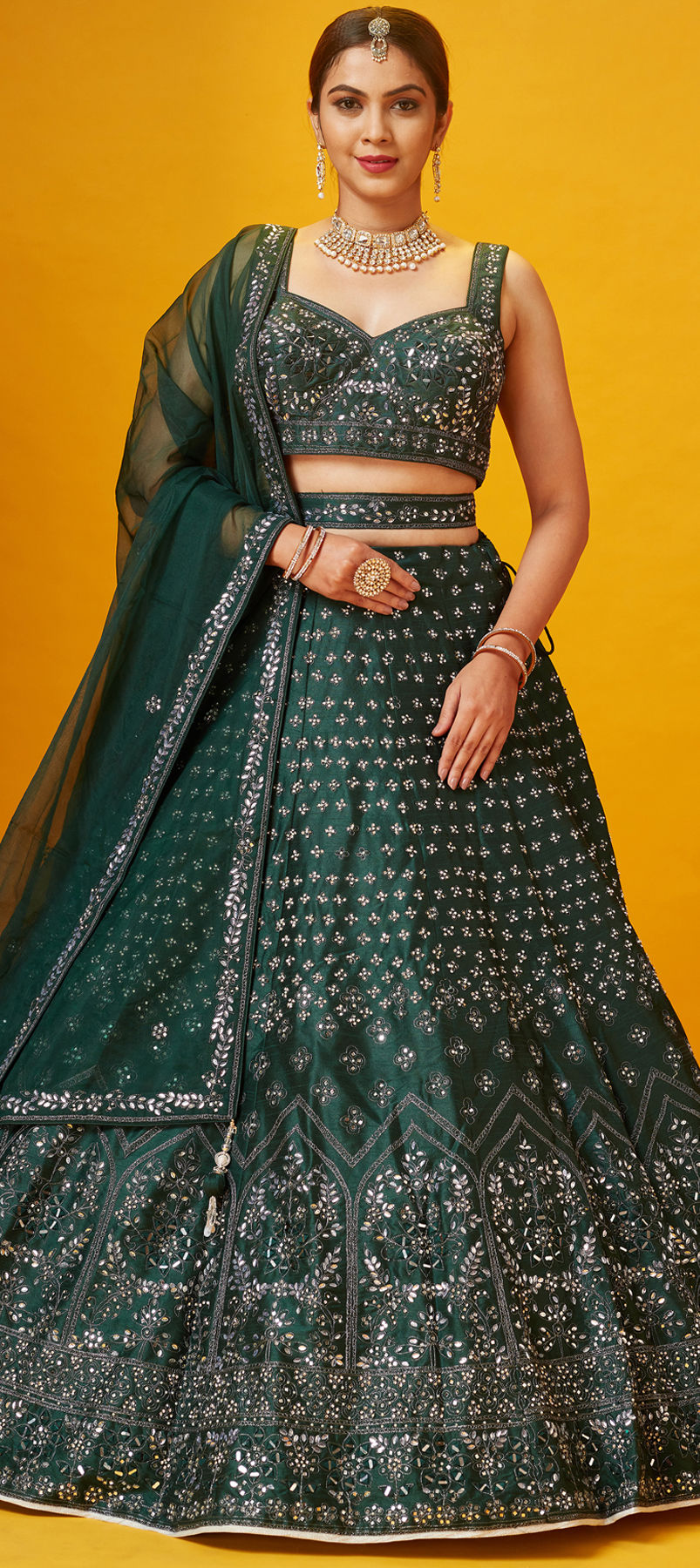 Sober Embroidered Work On Georgette Lehenga In Mehendi Green Color