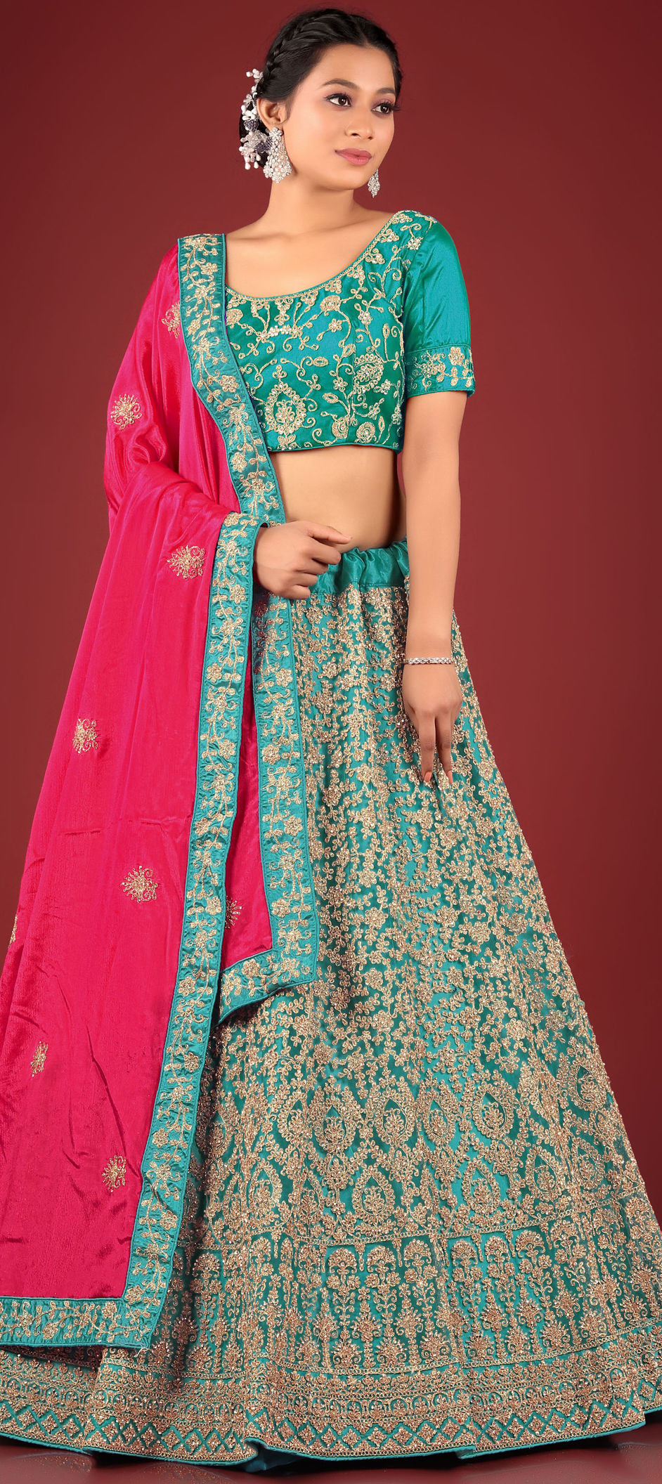 Lovely Turquoise Soft Net Lehenga Choli with Sequence and Thread Work.