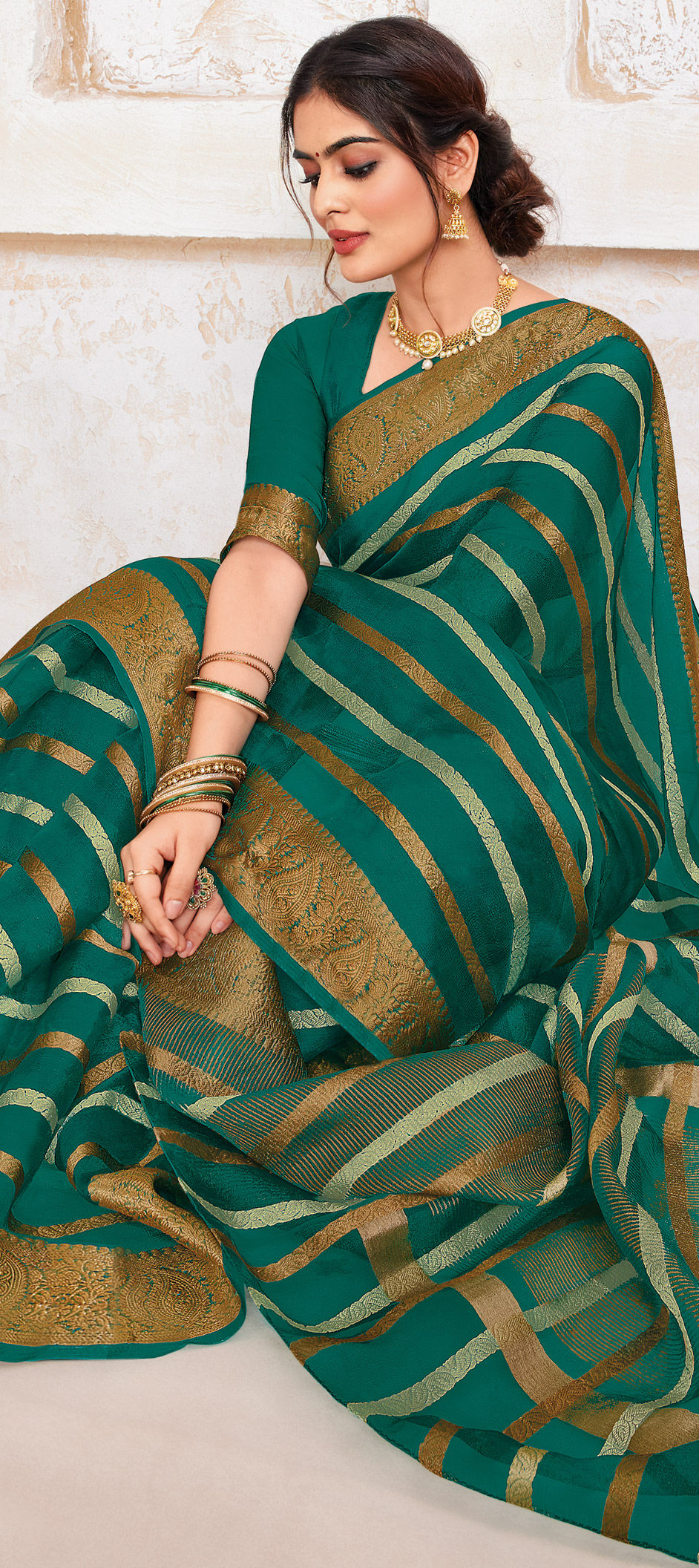 Green Ethnic Motifs HandWoven Organza Silk Saree with Gold Zari Border