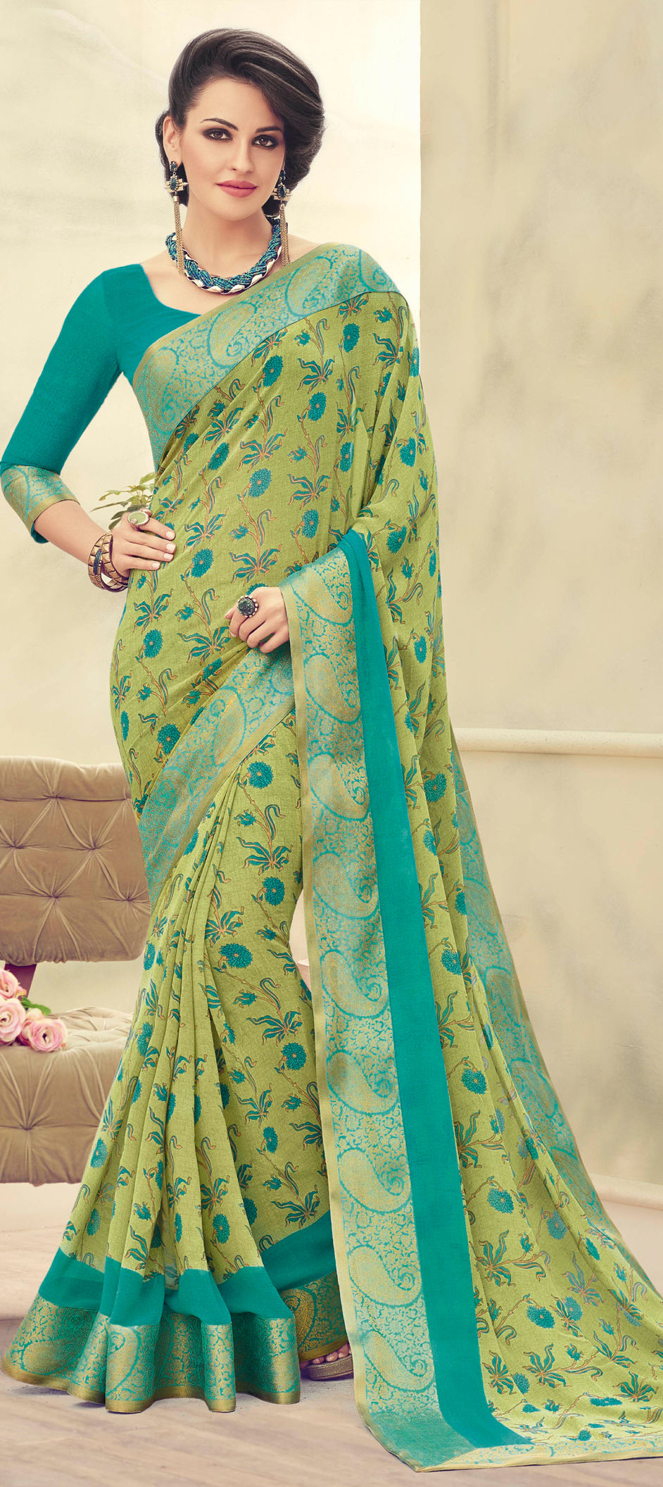 748157: Green color family Printed Sarees with matching unstitched blouse.