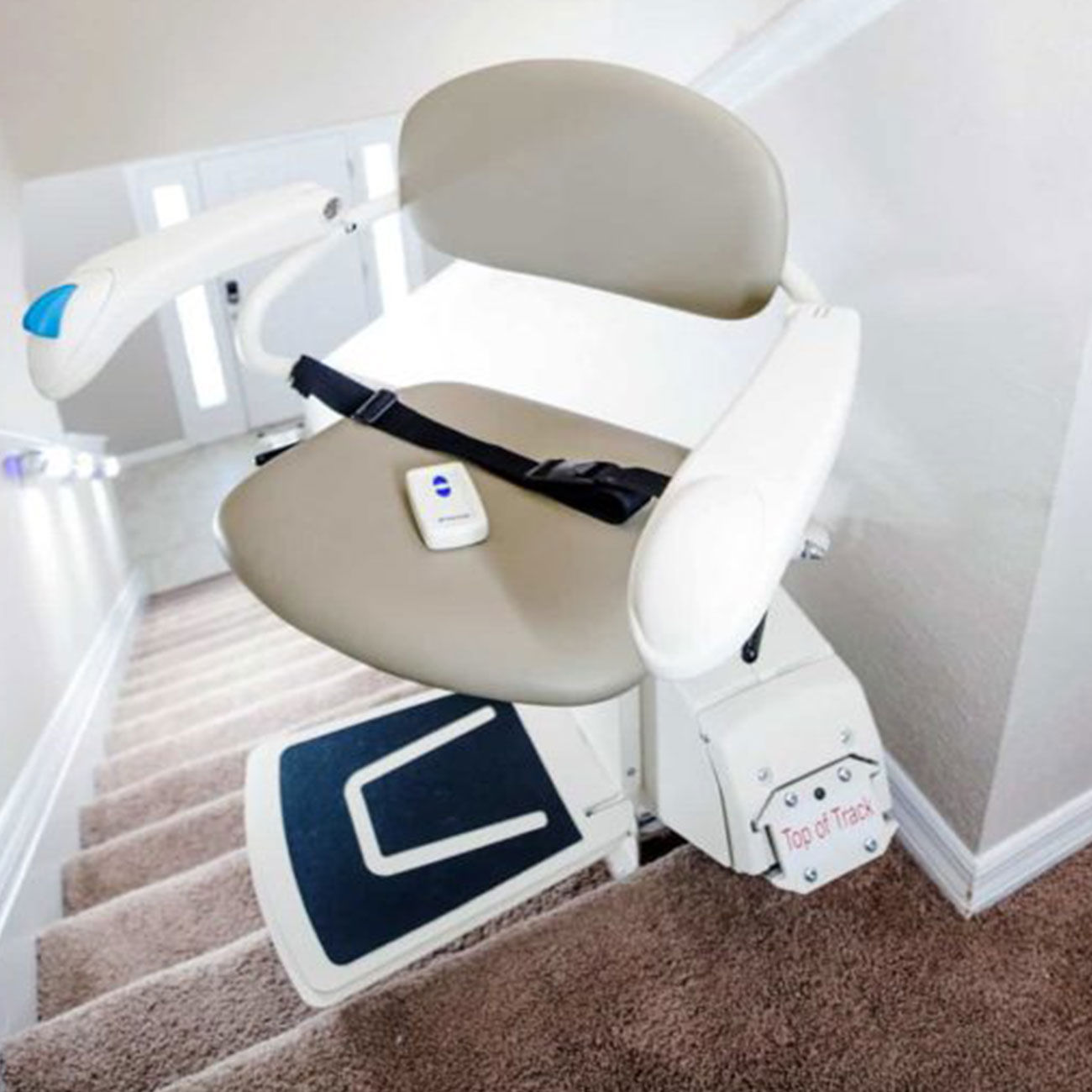 image demoing chair lifts ability to swivel at top of staricase