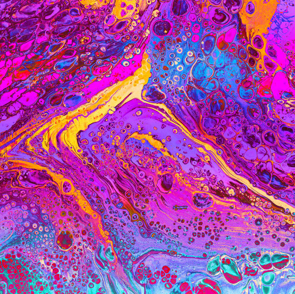 Acrylic pour of magenta, violet and marigold cutting diagonally across the frame, dense with cells at the edges