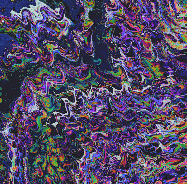 Acrylic pour of violet, lime and magenta rippling in tight zigzag waves over near-black