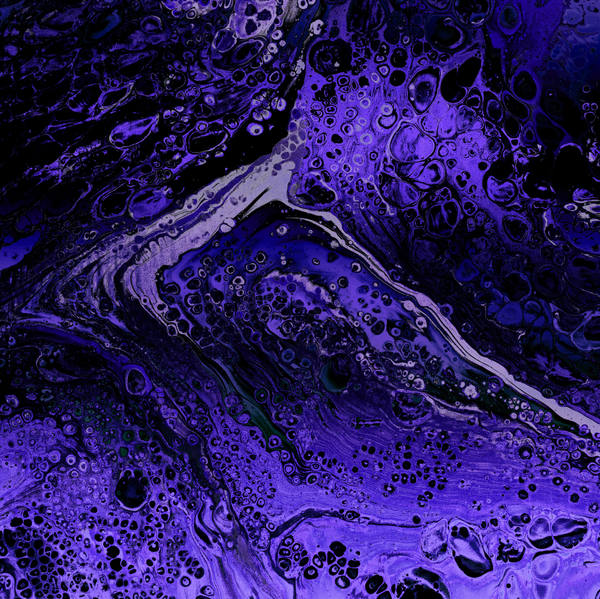 Acrylic pour of deep violet over black, a pale silver current cutting diagonally through clusters of dark cells