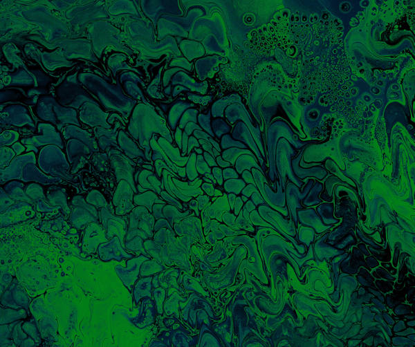 Acrylic pour of bright green over deep bottle green and black, flowing in thick viscous ribbons