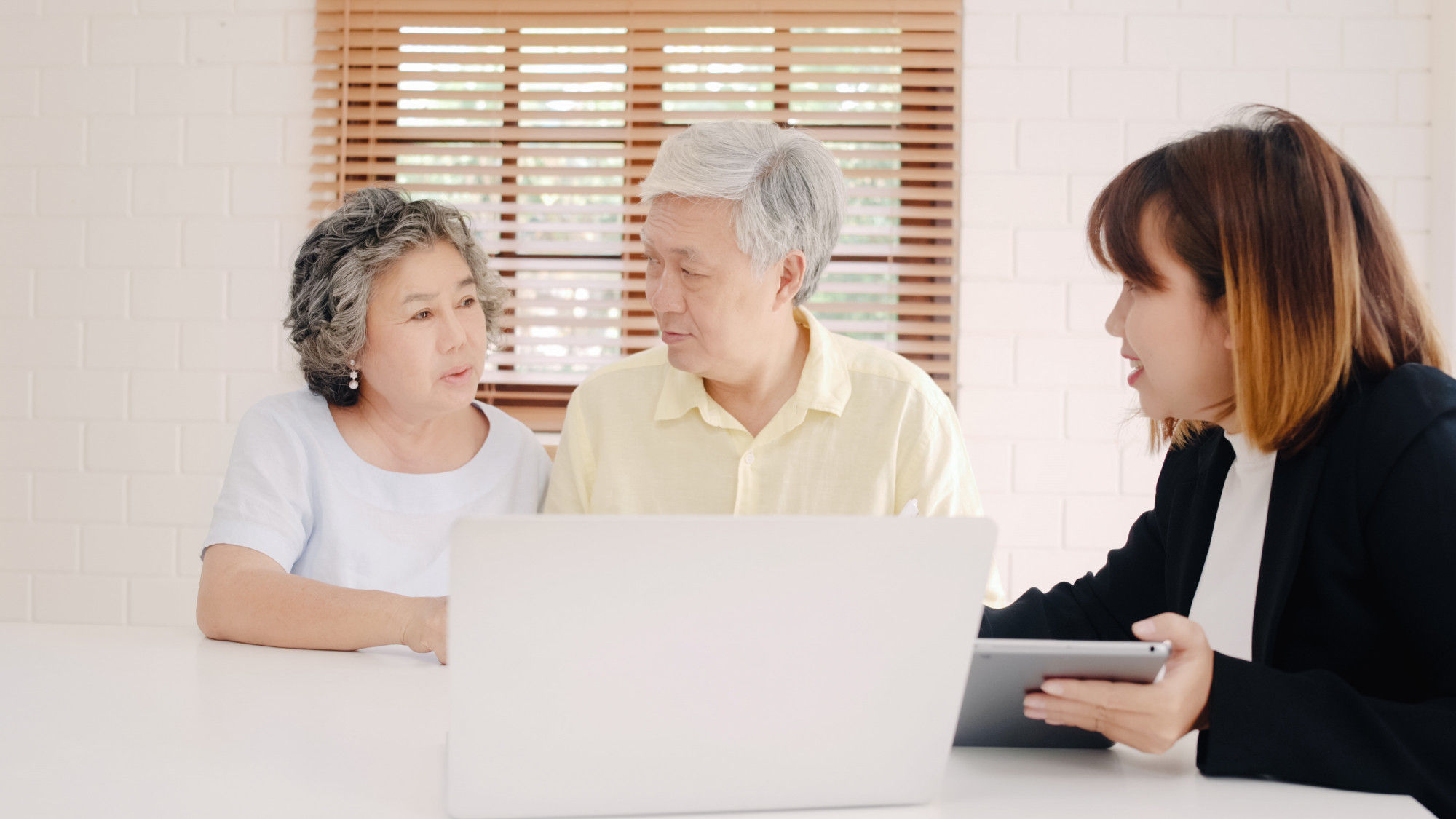 Elderly couple receiving financial advice
