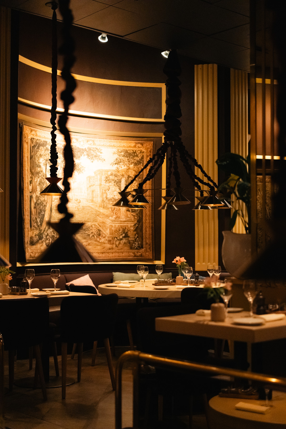 Warmly lit restaurant dining room