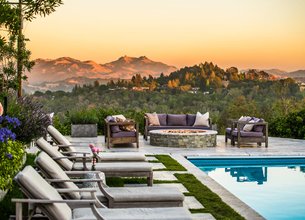 Exceptional Living with Privacy, Views, Acreage and Prime Location!