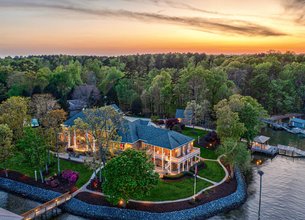 Lakefront Estate with 600' of Waterfront + Expansive Channel Views