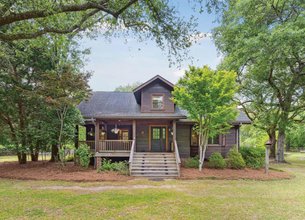 Nestled on 81+ Acres of Lush Land on Johns Island