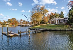 Beautifully Renovated to Capture Extensive Water Views 