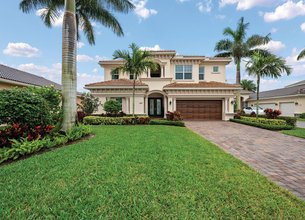 STUNNING wide LAKE and GOLF COURSE VIEWS in Jupiter Country Club