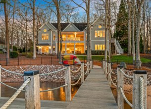 Indulge in Upscale Lakeside Living within the Prestigious Point Community