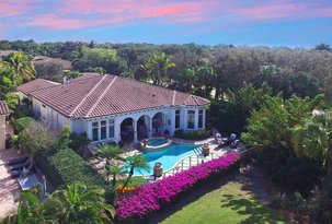 Stunning Interior and Tropical Living Areas with Views of the Golf Course