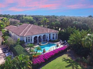 Stunning Interior and Tropical Living Areas with Views of the Golf Course