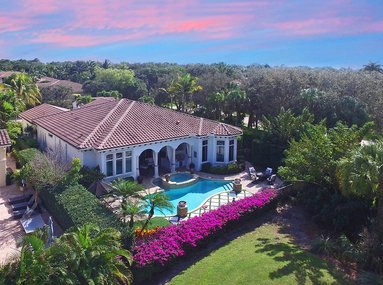 Stunning Interior and Tropical Living Areas with Views of the Golf Course