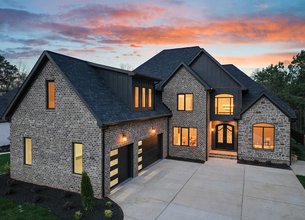 New Construction Nestled Within the Coveted Norman Pointe Community