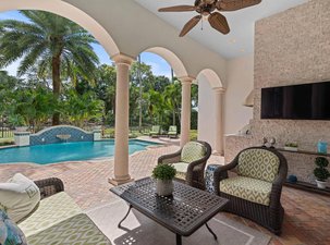 Elegant Home Situated in Old Palm Golf Club