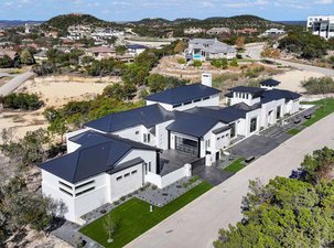 Transitional Hill Country Estate with Panoramic Views in The Dominion