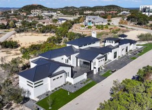 Transitional Hill Country Estate with Panoramic Views in The Dominion