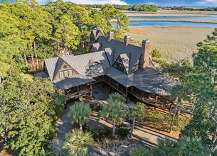 Architecturally Distinct Marsh front Estate on Double Lot