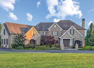 French Country Revival Overlooking 13.8 Sweeping Acres