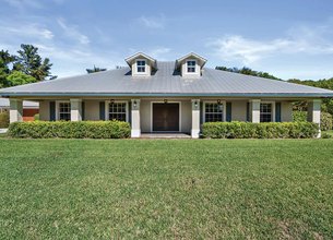 Rare 12-Acre Estate with Private Lake