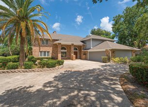 Nestled Within the Harbor Bluffs Waterfront Neighborhood