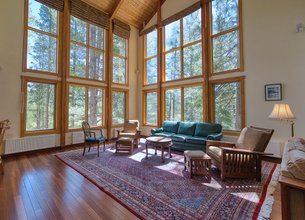 A Masterfully Crafted Mountain Lodge Among the Pines, Above the Rest
