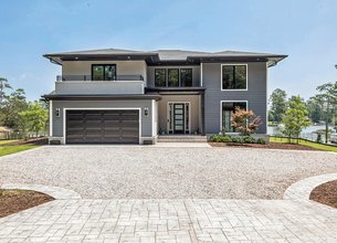 Stunning 2023 Contemporary Waterfront Home with Deep Water Access